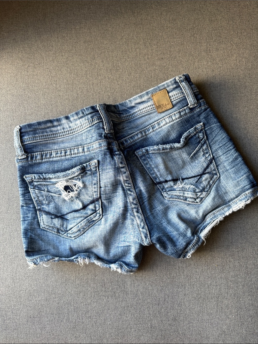 BKE Women's Washed Blue Distressed Denim Shorties - Picture 2 of 2